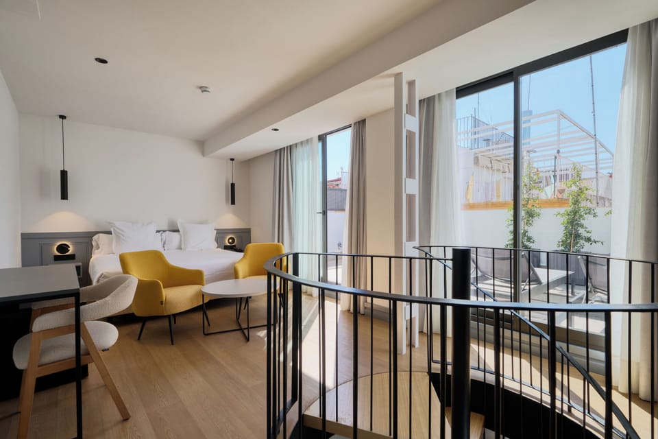 Deluxe Room, Terrace with Jacuzzi | Free minibar items, in-room safe, desk, laptop workspace