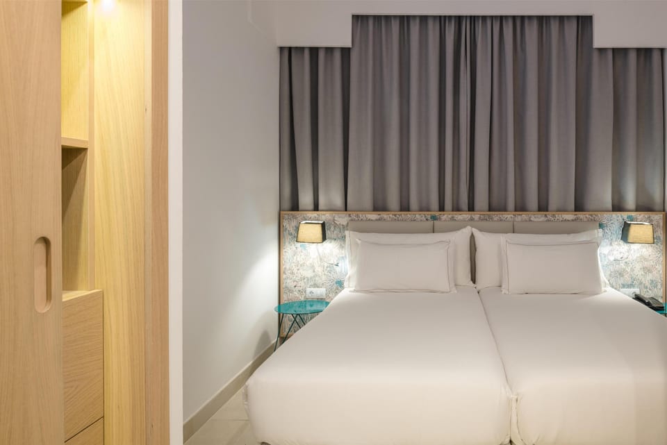 In-room safe, blackout drapes, WiFi (free), bed sheets