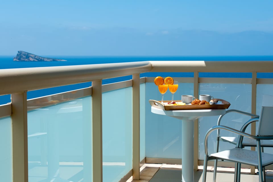 Junior Suite, 1 Queen Bed, Terrace, Sea View | Minibar, desk, laptop workspace, blackout drapes