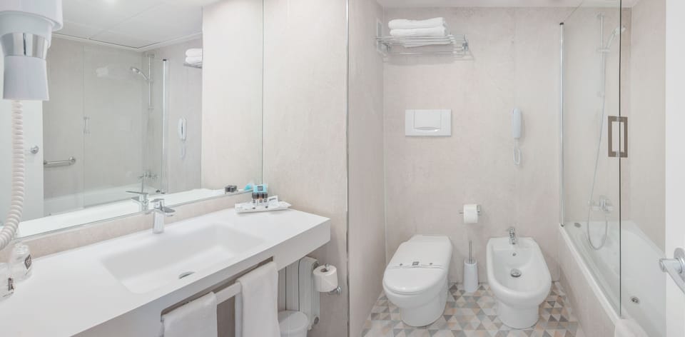 Free toiletries, hair dryer, bidet, towels