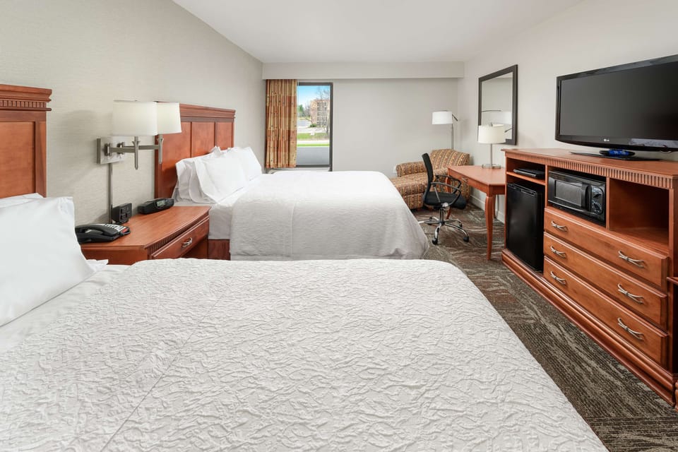 Room, 2 Queen Beds, Microwave | In-room safe, iron/ironing board, free cribs/infant beds
