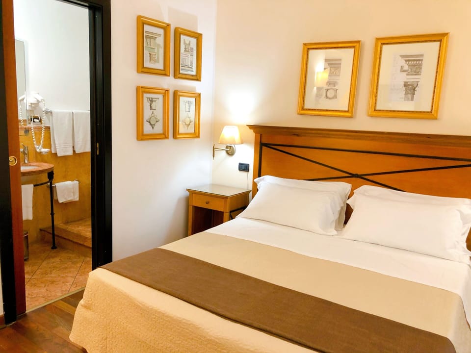 Double Room | 2 bedrooms, down comforters, minibar, in-room safe