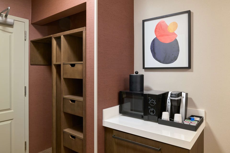 Desk, laptop workspace, blackout drapes, iron/ironing board