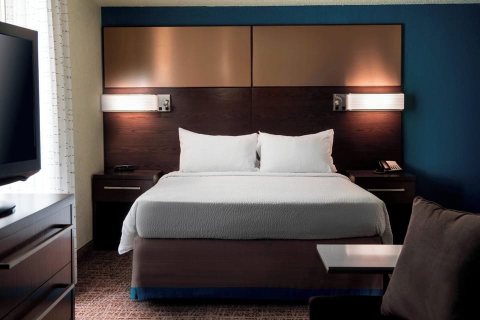 Hypo-allergenic bedding available, down comforters, desk