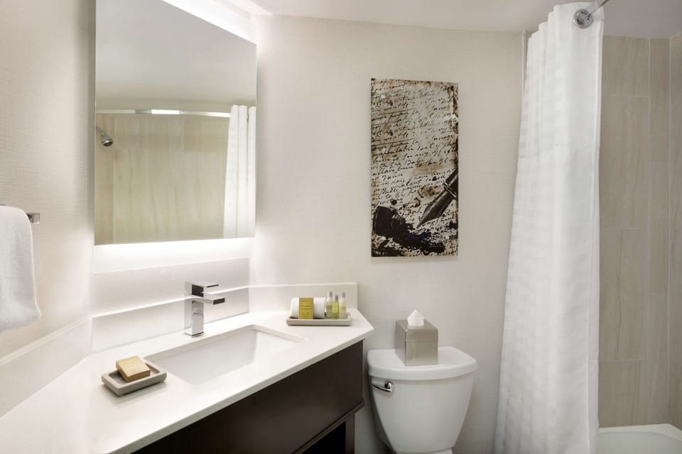 Combined shower/tub, free toiletries, hair dryer, bathrobes