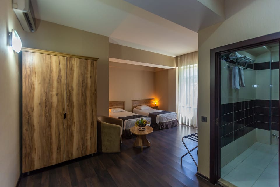Standard Twin Room | Premium bedding, in-room safe, desk, blackout drapes