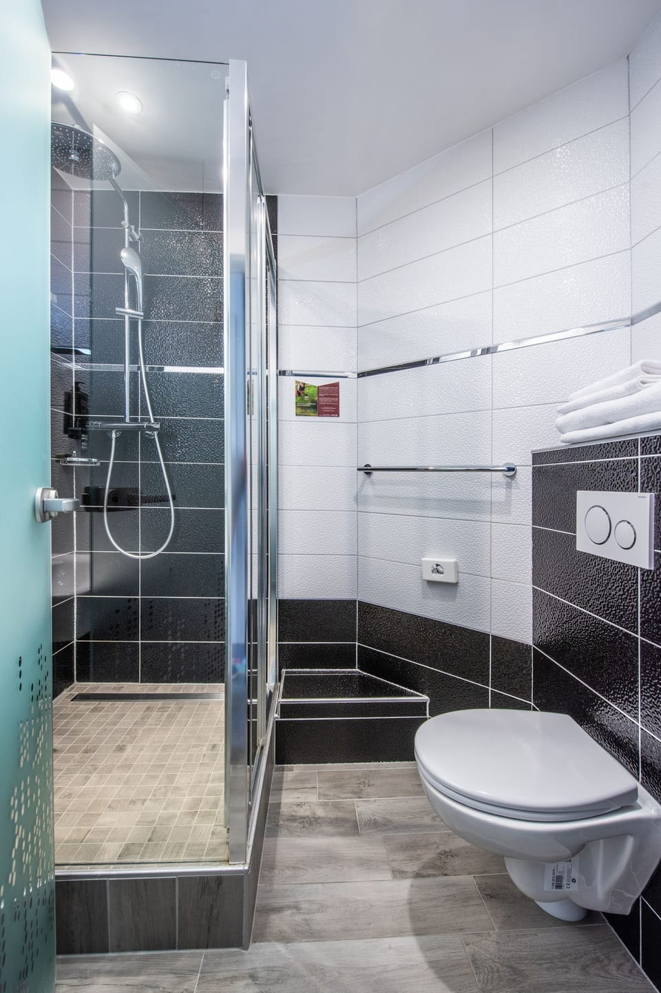 Shower, rainfall showerhead, eco-friendly toiletries, hair dryer