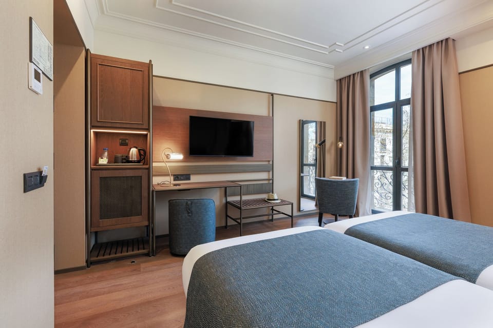 Down comforters, minibar, in-room safe, desk