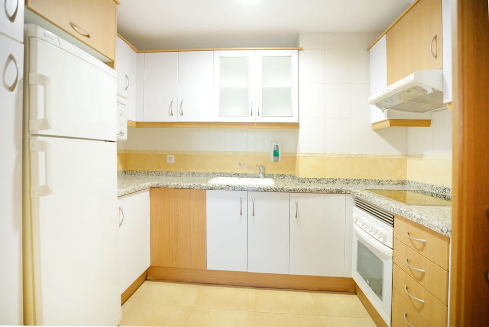 Fridge, microwave, cookware/dishes/utensils