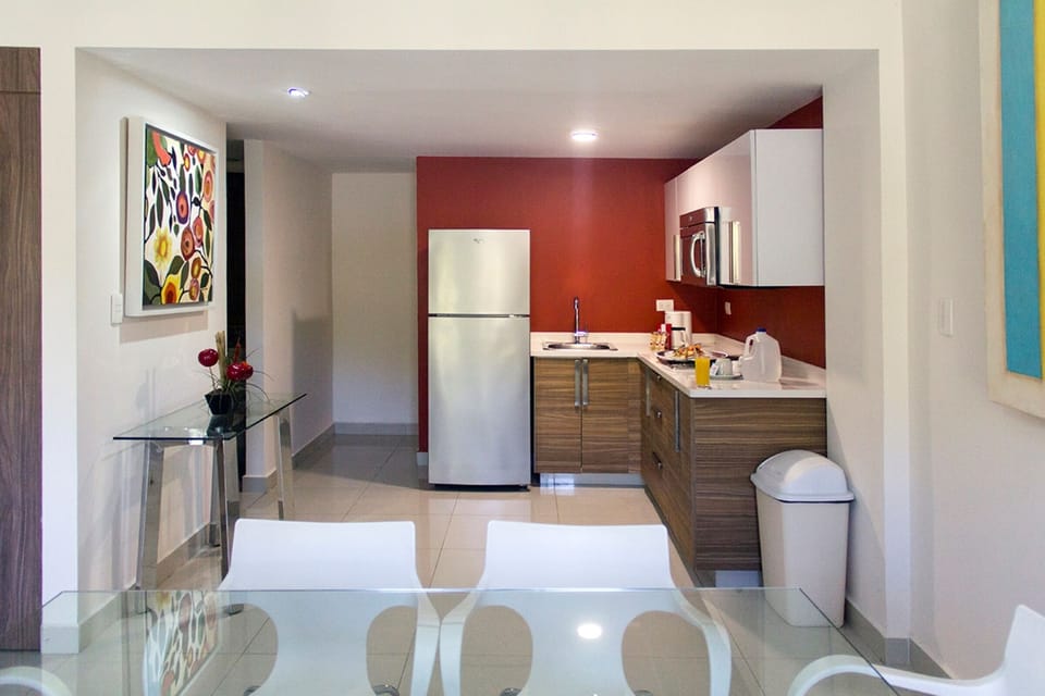 Superior Suite, 2 Bedrooms | Private kitchen | Coffee/tea maker, full-size fridge, microwave