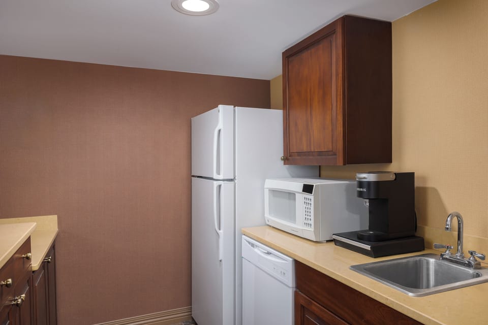 Suite, 1 King Bed, Non Smoking | Private kitchen | Shared fridge, microwave, coffee/tea maker