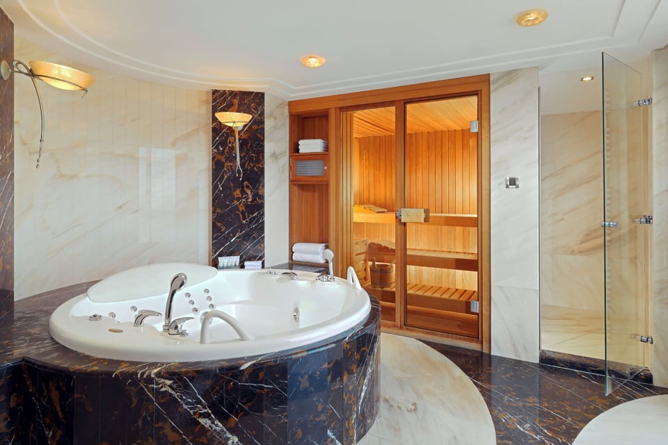Presidential Suite, 2 Bedrooms, City View | Bathroom | Combined shower/tub, free toiletries, hair dryer, bathrobes