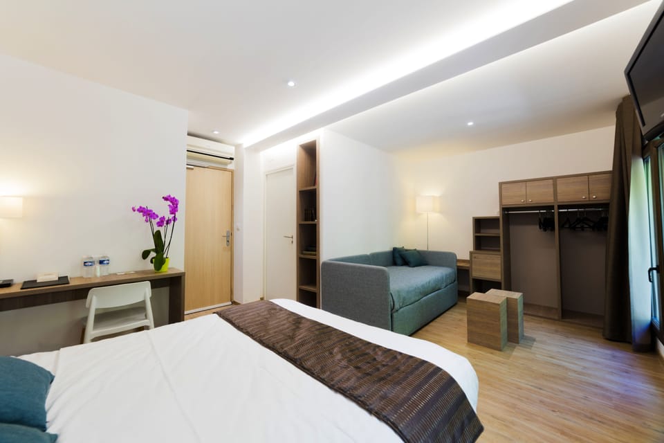 Quadruple Room, Bathtub | In-room safe, desk, laptop workspace, iron/ironing board