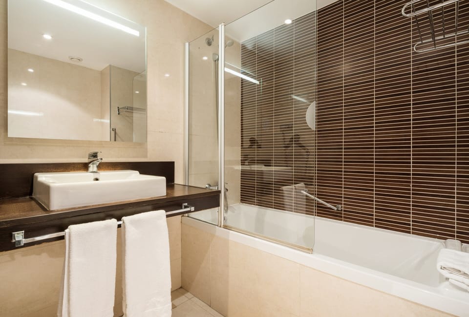 In-room safe, desk, laptop workspace, blackout drapes