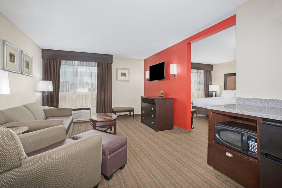 Suite, 1 King Bed, Accessible (Hearing, Roll-In Shower) | Desk, iron/ironing board, free cribs/infant beds, rollaway beds