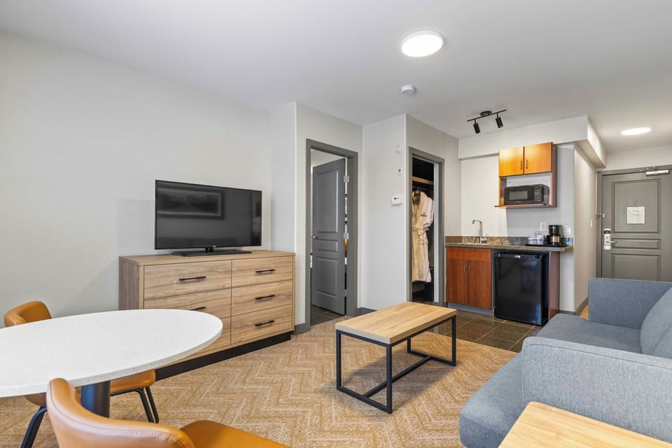 Suite, 1 King Bed, Kitchenette (Jacuzzi) | Living area | TV