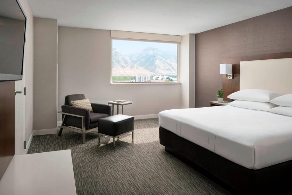 Premium bedding, down comforters, pillowtop beds, in-room safe