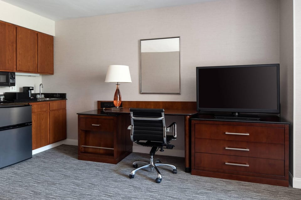 Premium bedding, down comforters, pillowtop beds, in-room safe