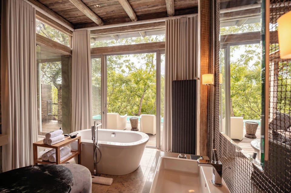 Superior Villa | Bathroom | Separate tub and shower, deep soaking tub, rainfall showerhead