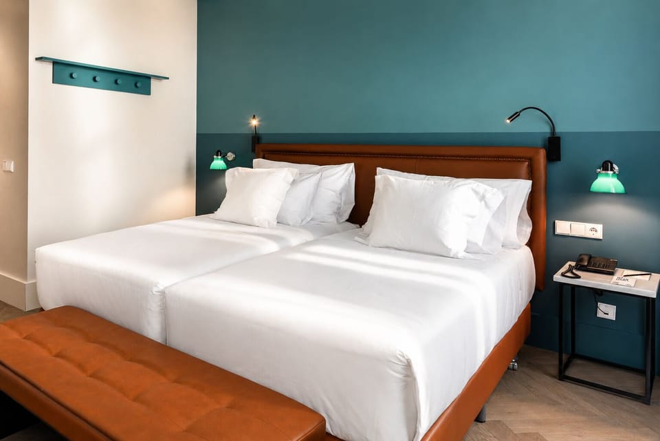 Premium bedding, down comforters, minibar, in-room safe