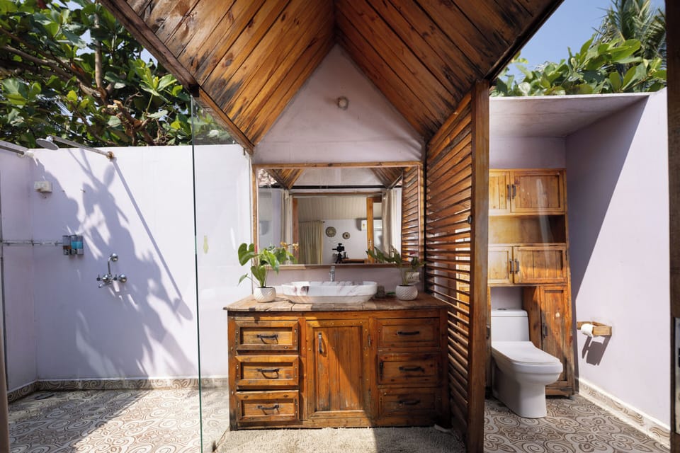 Sea View Hut (Upstairs) | Bathroom shower