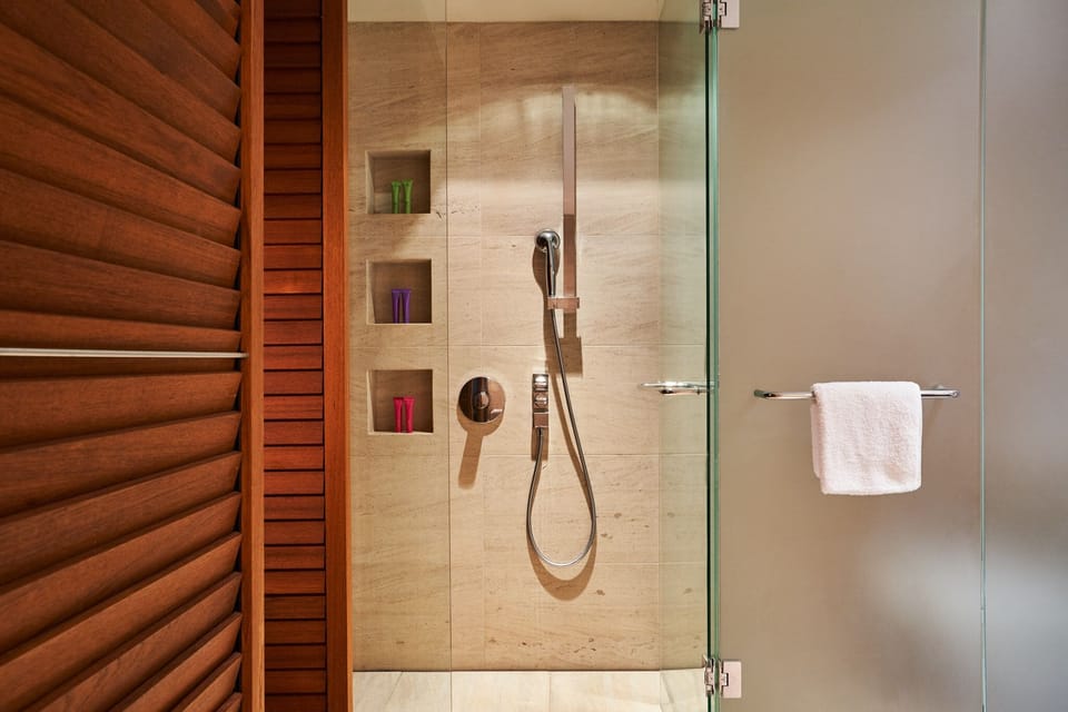 Rainfall showerhead, designer toiletries, hair dryer, bathrobes