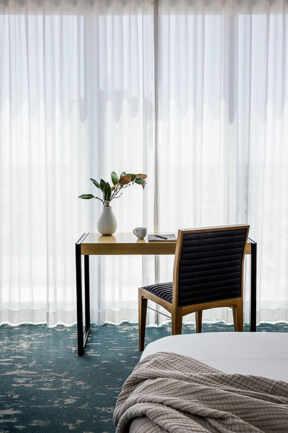 Premium bedding, down comforters, Select Comfort beds, in-room safe