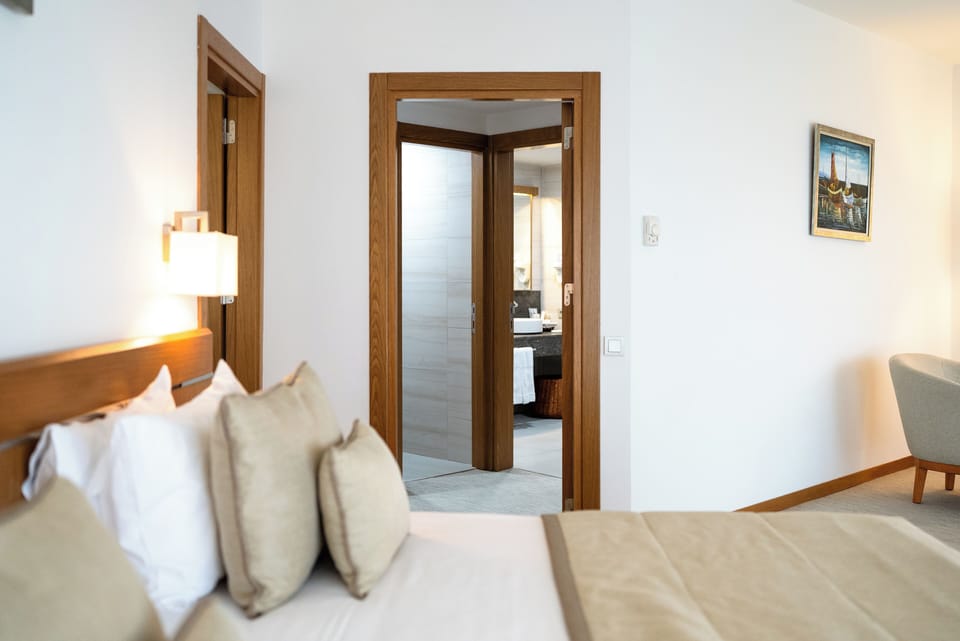 Executive Suite, Balcony, Sea View | Minibar, in-room safe, desk, laptop workspace