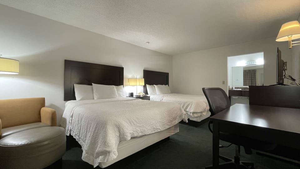 Standard Room, 2 Queen Beds, Non Smoking | Desk, laptop workspace, free WiFi, bed sheets