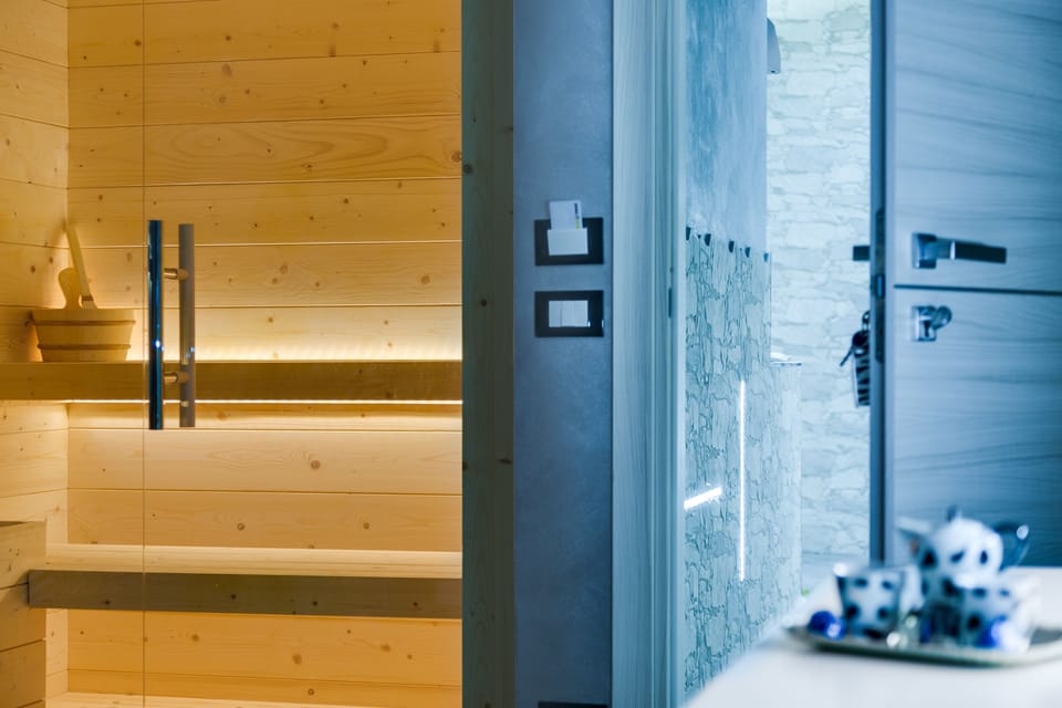 Luxury Suite, 1 Bedroom, Sauna | Memory foam beds, minibar, in-room safe, desk