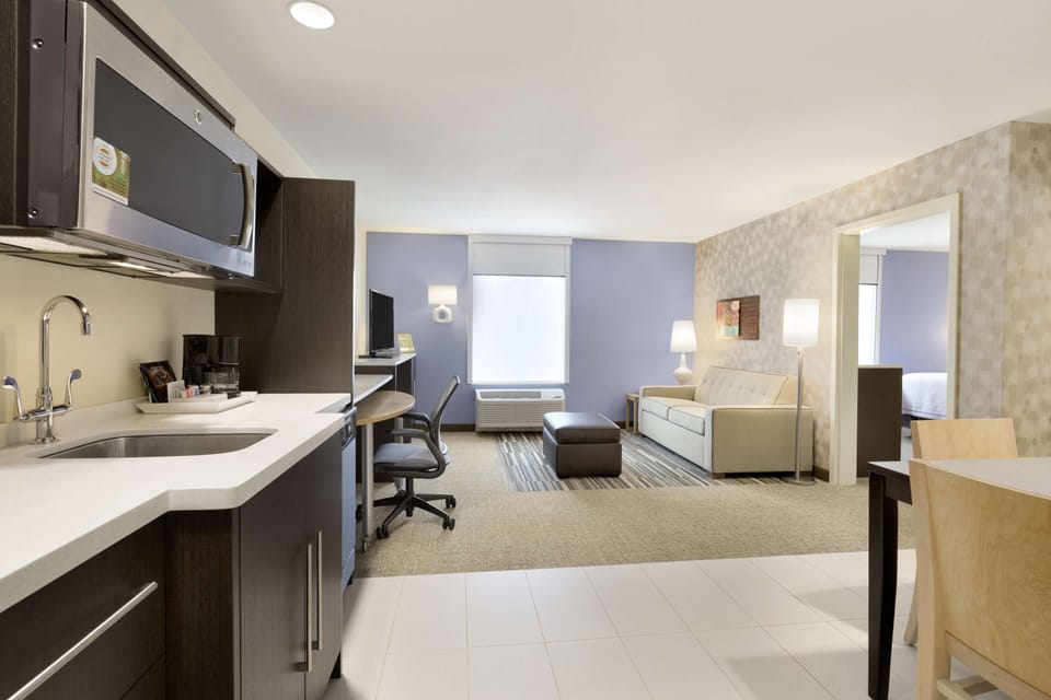 Suite, 1 Bedroom, Non Smoking | Living area | 42-inch flat-screen TV with premium channels, TV, MP3 dock
