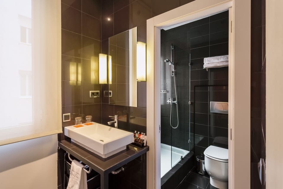 Eco-friendly toiletries, hair dryer, towels