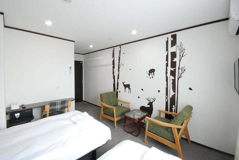 Basic Twin Room, Non Smoking, Refrigerator (2 Single Beds Or 1 King Bed) | In-room safe, desk, WiFi (free), bed sheets