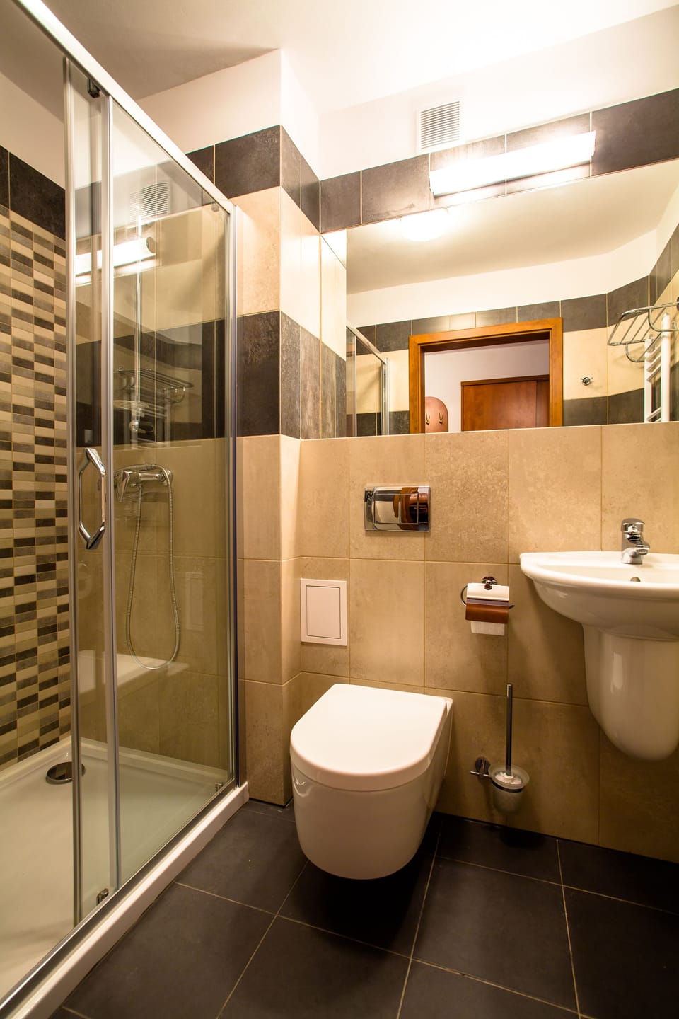Shower, hair dryer, towels, toilet paper