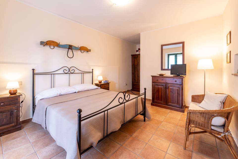 Apartment, 1 Bedroom (Olivo D) | Iron/ironing board, free cribs/infant beds, free WiFi, bed sheets