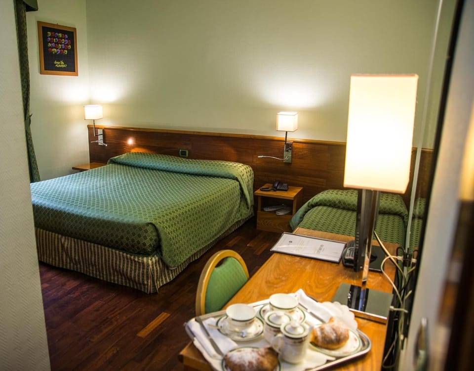 Down comforters, minibar, desk, blackout drapes