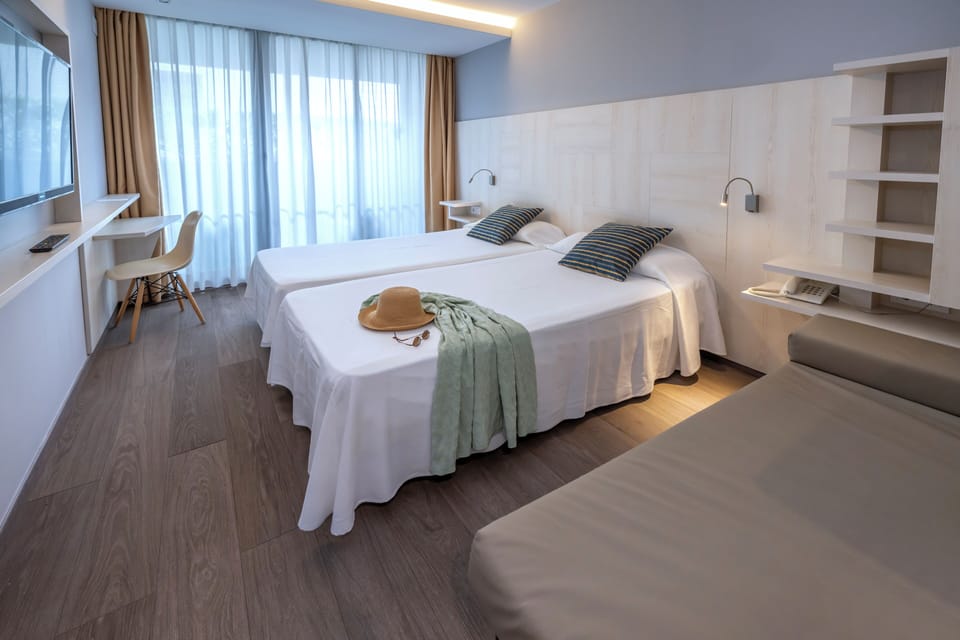Economy Double Room, Balcony | In-room safe, desk, laptop workspace, soundproofing