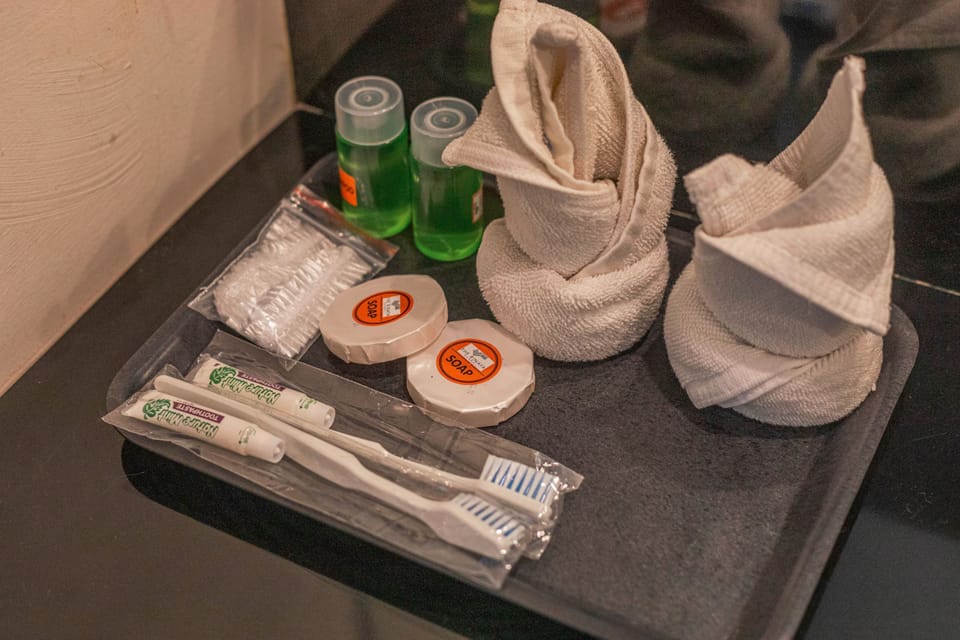 Shower, free toiletries, slippers, towels