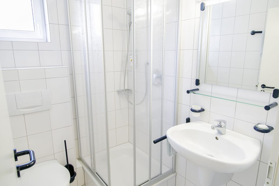 Shower, free toiletries, hair dryer, towels