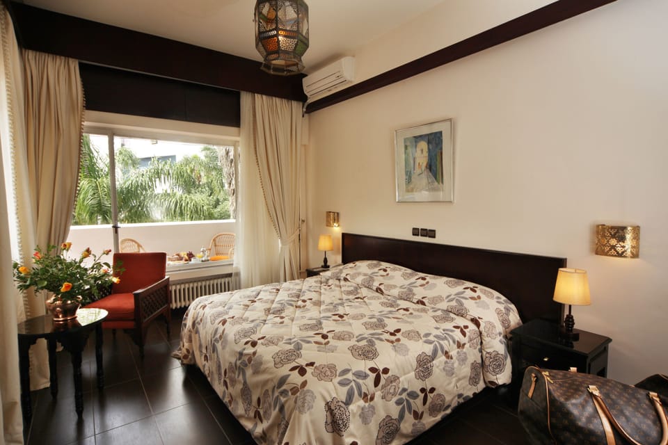 Standard Double Room | Desk, blackout drapes, free cribs/infant beds, rollaway beds