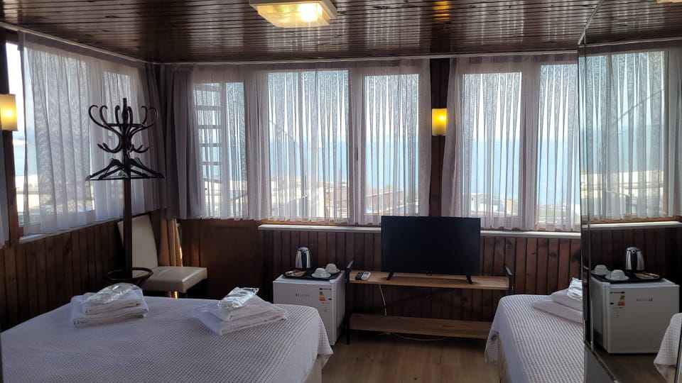 Panaromik Uc Kisilik Oda, Deniz Manzarali (450) | Egyptian cotton sheets, premium bedding, Select Comfort beds, minibar