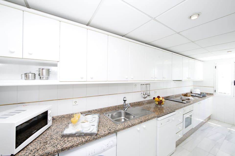 Fridge, microwave, dishwasher, coffee/tea maker