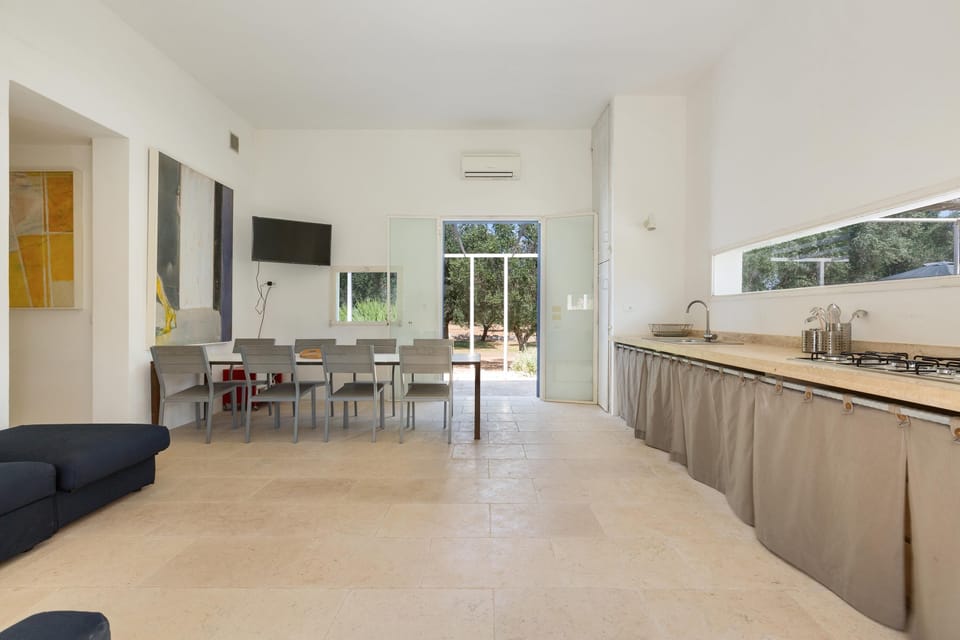 Villa, 4 Bedrooms | Private kitchen | Fridge, microwave, stovetop, cookware/dishes/utensils