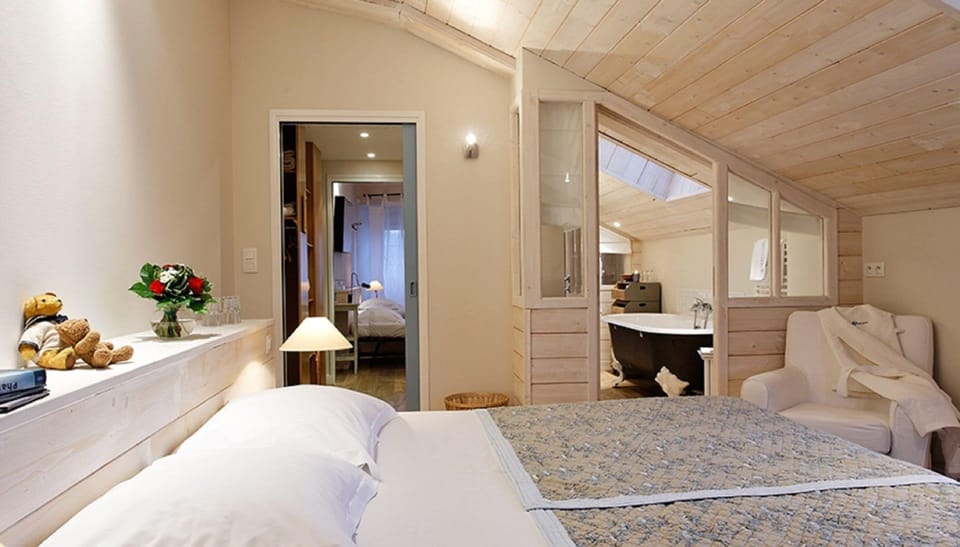 Family Suite, 2 Bedrooms | In-room safe, desk, iron/ironing board, free WiFi