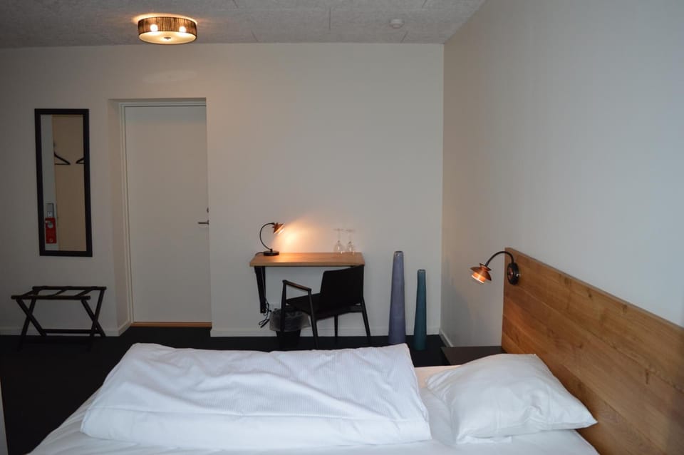 Desk, blackout drapes, soundproofing, iron/ironing board