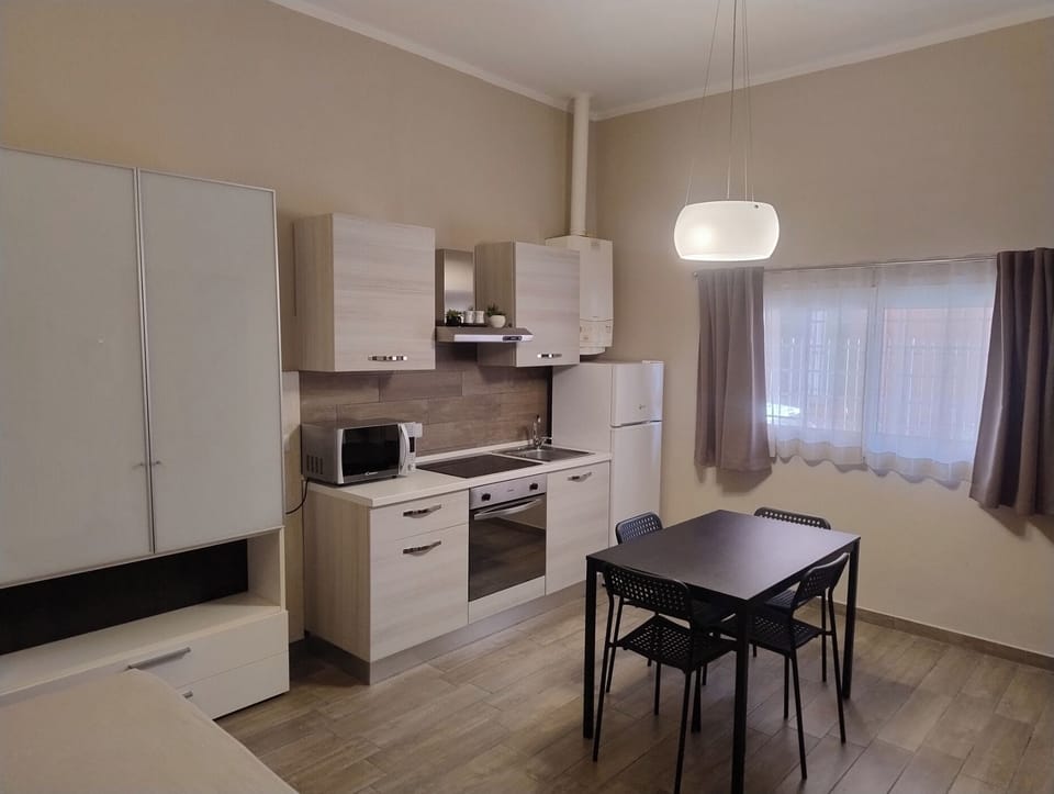 Basic Apartment, 1 Bedroom | Living area | Flat-screen TV