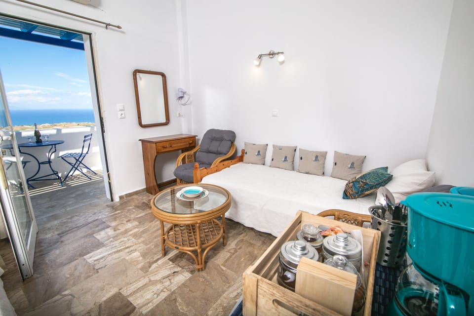 Standard Room, Sea View | Living area | Flat-screen TV