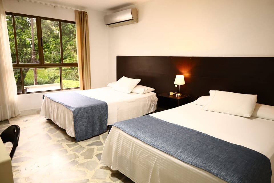 Comfort Quadruple Room, 2 Double Beds | Minibar, desk, laptop workspace, free WiFi