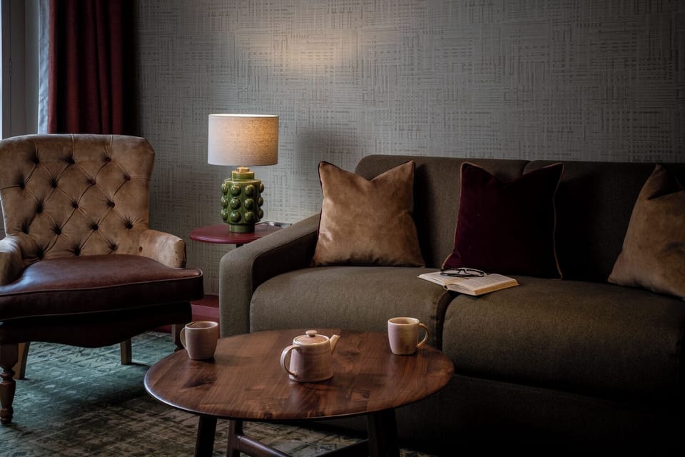 Feature Double Room with Sofa Bed | Living area | Flat-screen TV