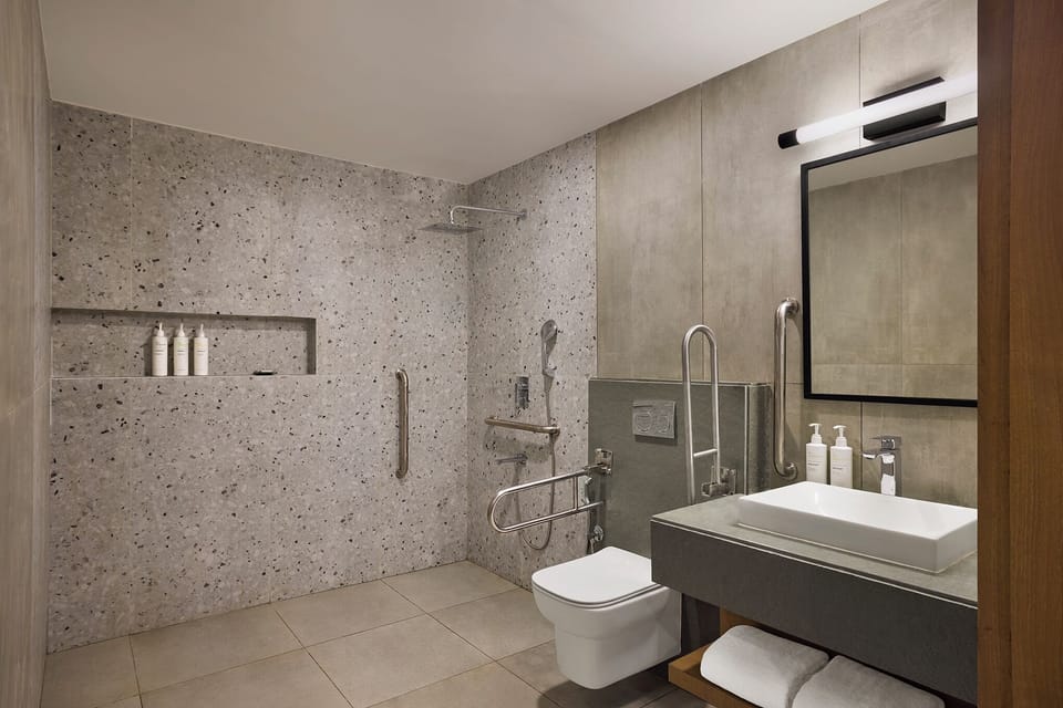 Room, 1 Queen Bed, Accessible | Bathroom | Shower, free toiletries, hair dryer, towels